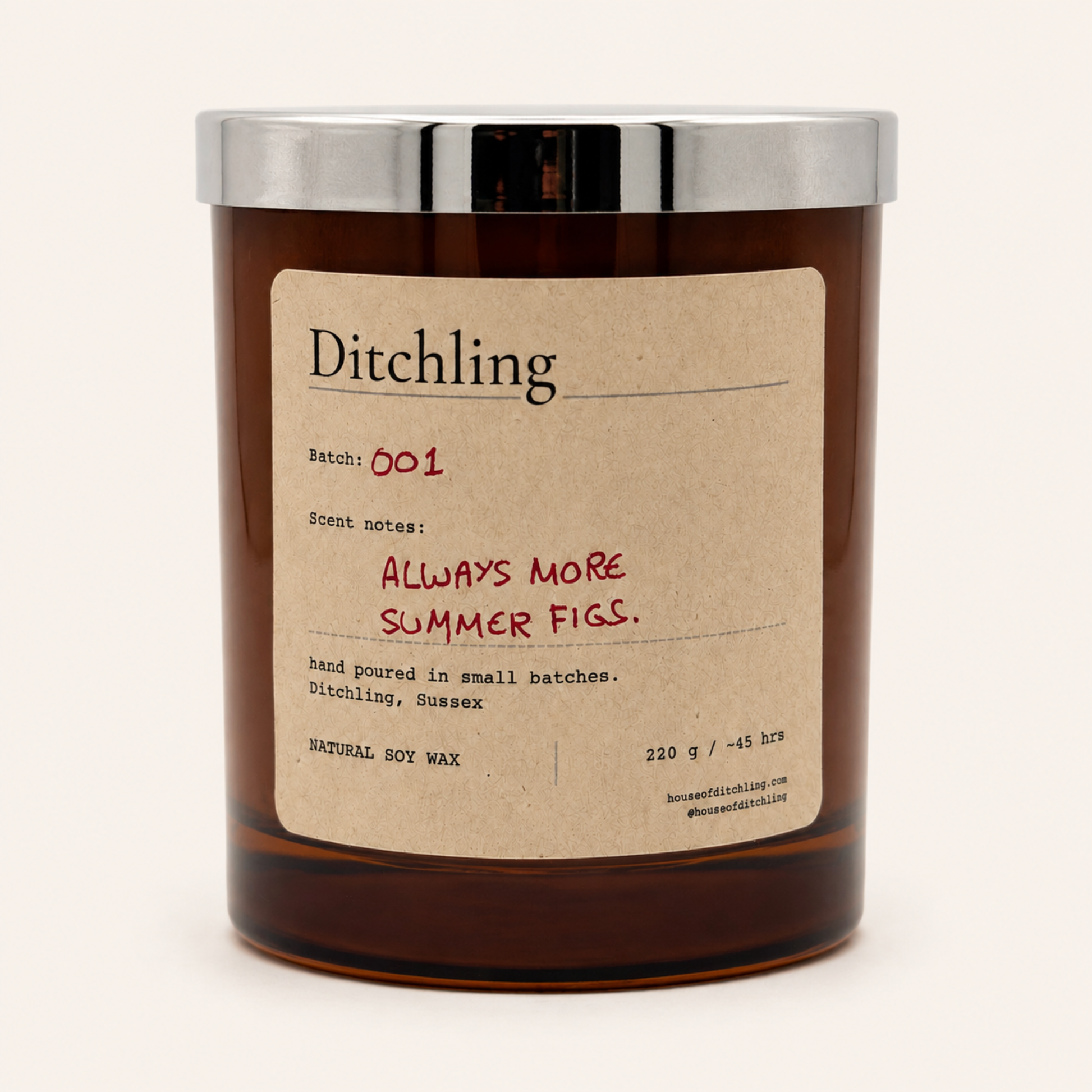 Amber glass ALWAYS MORE SUMMER FIGS scented soy candle with a silver lid by Ditchling, shown open on a clean white background.